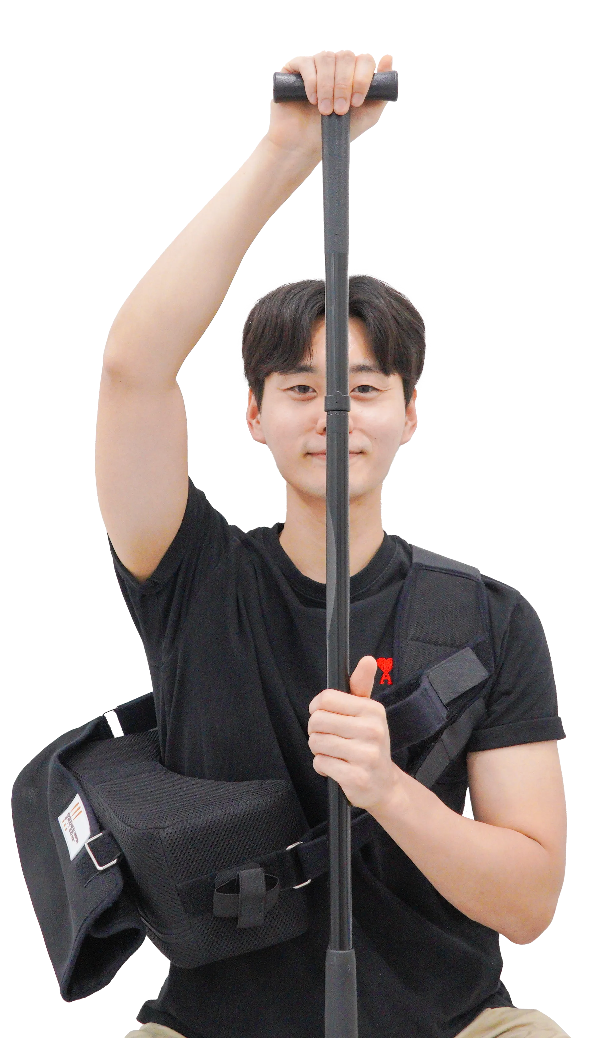 어깨 수술 후 T바(지팡이)를 이용한 재활 운동. 반대쪽 팔로 T바를 밀어 올려 수술한 팔을 들어 올린다